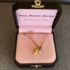 Juicy Couture half heart with gem gold necklace.